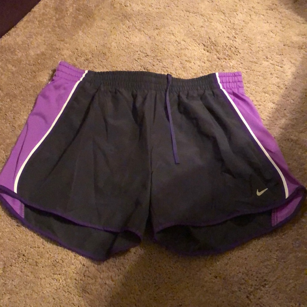 Gray and purple Nike shorts